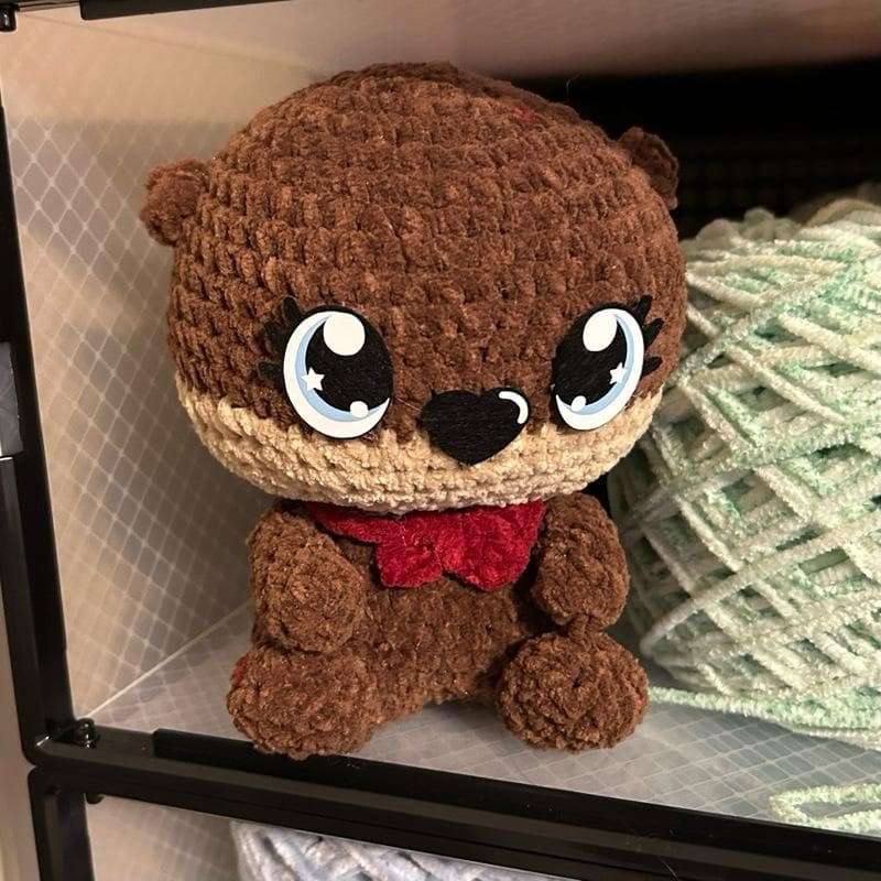 Handmade crochet otter plushie with bow tie